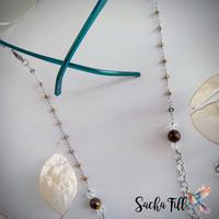 Portaocchiali trasformabile con occhio di tigre