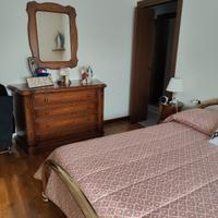 letto in ottone dorato con nodo amore