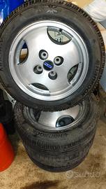 cerchi in lega per ritmo completi di gomme 85s