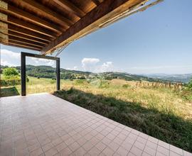 PORZIONE DI BIFAMILIARE A CANOSSA