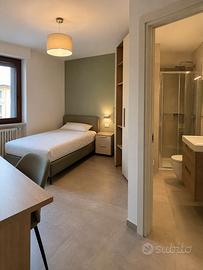 Luminosa stanza singola con bagno privato