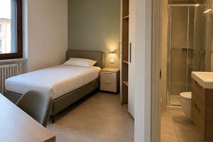 Luminosa stanza singola con bagno privato