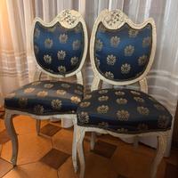 Coppia di sedie stile Luigi XV in legno intagliato