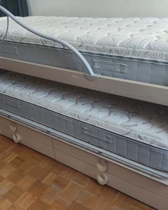 Letto doppio estraibile a scomparsa con cassetti