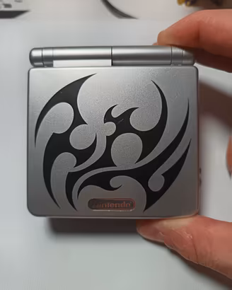 Nintendo game boy advance sp TRIBAL EDITION + game