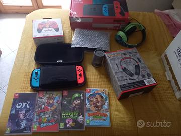 Switch console giochi e cuffie