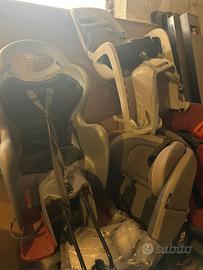 seggiolini per bici e due per auto