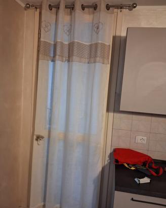 Tenda confezionata per porta finestra