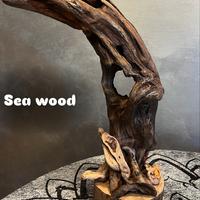 scultura artigianale in legno spiaggiato