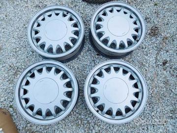 5 cerchi in lega+borchiette saab 900 cabriolet