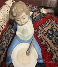 Statuetta Nao Lladro bambino pappa