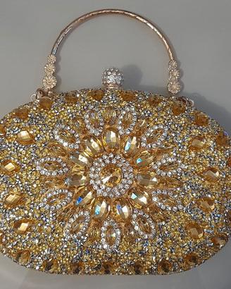 Pochette in stile Bohémien con pietre color oro