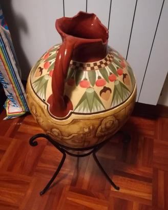 Vaso in cotto decorato con supporto in ferro