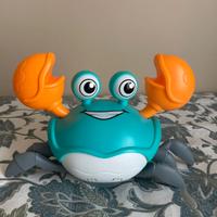 Giocattolo granchio musicale camminante
