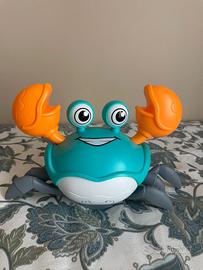 Giocattolo granchio musicale camminante
