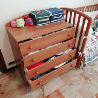 Lettino e comodino vedo