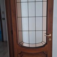 porte in legno con vetri. vedi foto. 