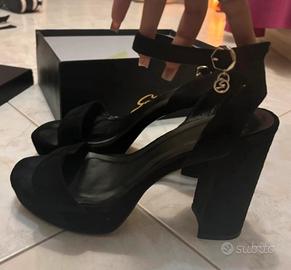 Tacchi neri con plateau, Gattinoni