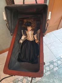 Bambola d'epoca inizi '900 con passeggino .ottimi