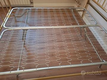 Reti singole per letto