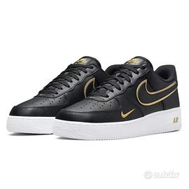 Nike air force nere e oro best sale