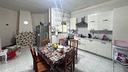 appartamento-in-villa-con-tavernetta-e-giardino