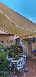 tenda da sole motorizzata con telecomando con sens