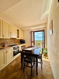 Casa con veranda a Posada