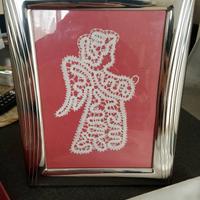 cornice in argento Sovrani 