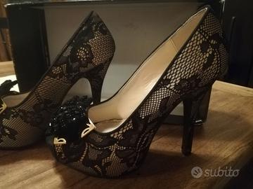 SCARPE DECOLLETE' DONNA tacco 10