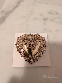 spilla dolce e gabbana 