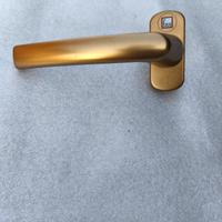 maniglie brunite per serramenti