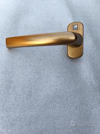 maniglie brunite per serramenti