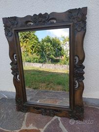 Specchio in teak intagliato