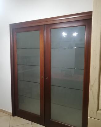 Porta a scomparsa in legno massello 