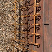 Antica testiera del letto in ferro battuto