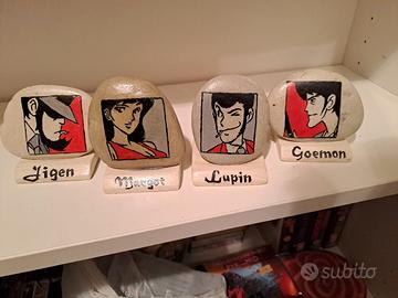 4 dipinti su sasso Lupin e squadra. 