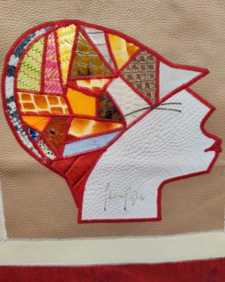 QUADRO TUTTO IN PELLE DONNA CON CAPPELLO 