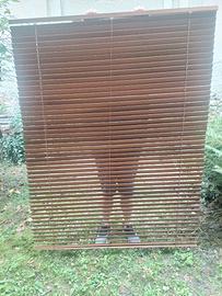 Veneziana con lamelle in legno