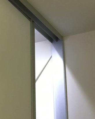 Binario per porte scorrevoli armadi