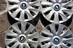 Cerchi in ferro e borchie originali BMW da 16'