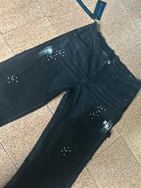 Jeans flared nuovo con cartellino