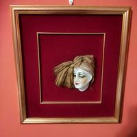 quadro con faccia in porcellana bisque