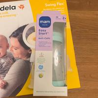 Tiralatte medela+buste raccolta latte+biberon mum