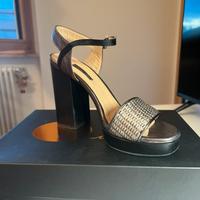 Plató - Can.metal acciaio/guvè nappa nera A.Pinto