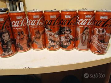 Lotto 7 lattine coca cola marvel + 4 omaggi