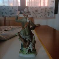 statuina Capodimonte  cacciatore con cane