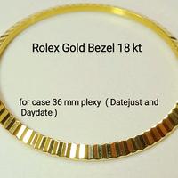 ROLEX , Lunetta scanalata in oro