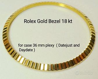 ROLEX , Lunetta scanalata in oro