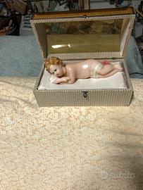 Bambinello con movimento